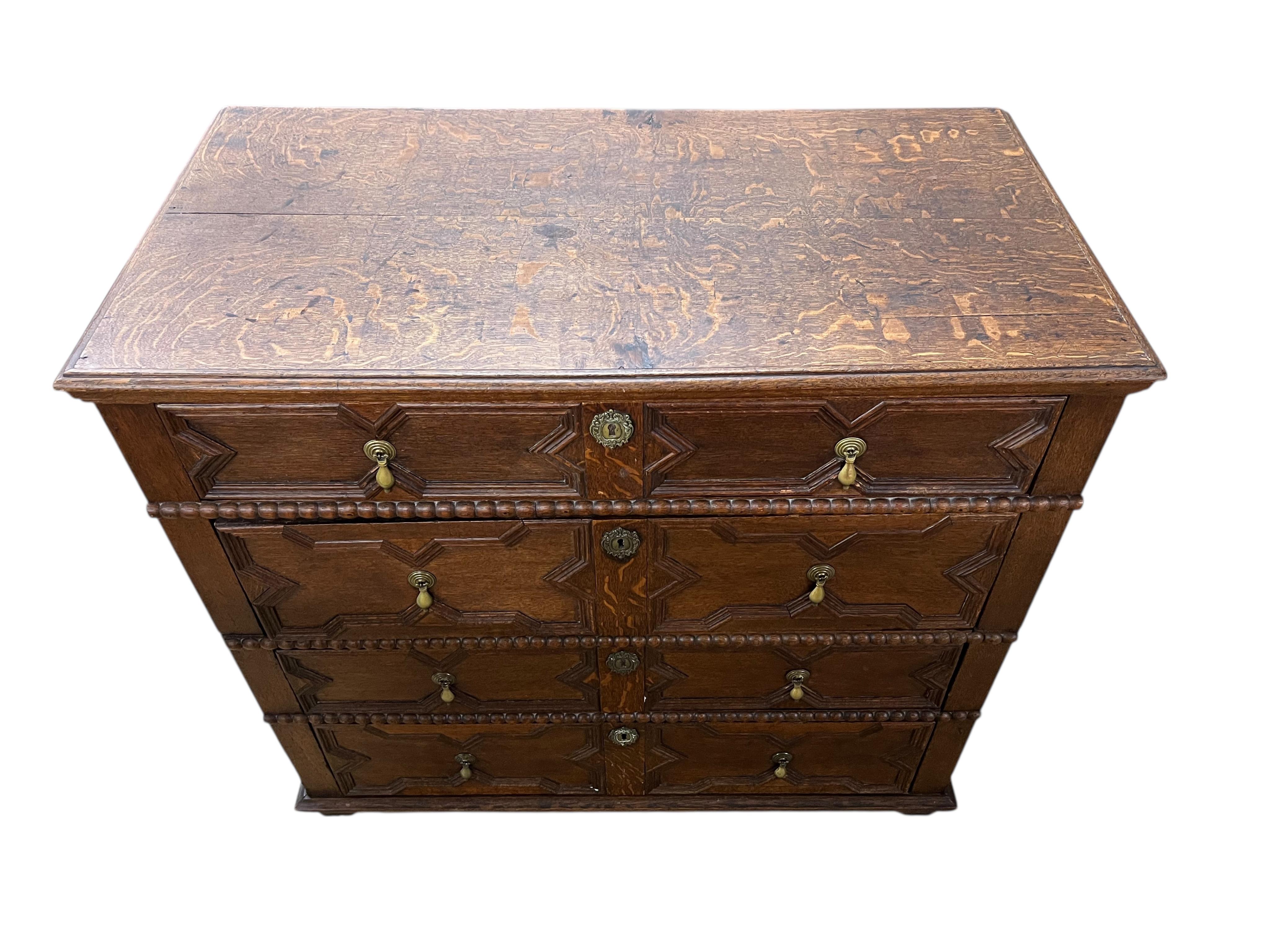 An early 18th century oak two part chest of drawers, width 102cm, depth 53cm, height 93cm